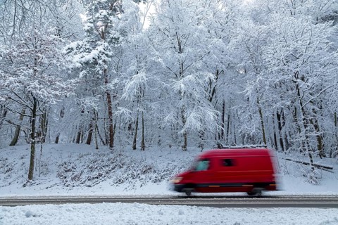 Delivery truck drives through snowy landscape, trees, winter, snow, Sieversen, Samtgemeinde