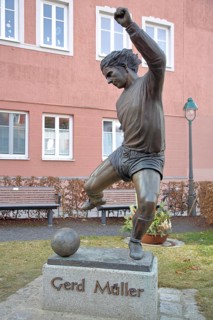 Memorial to soccer player Gerd Müller, German national team player, soccer legend, bronze