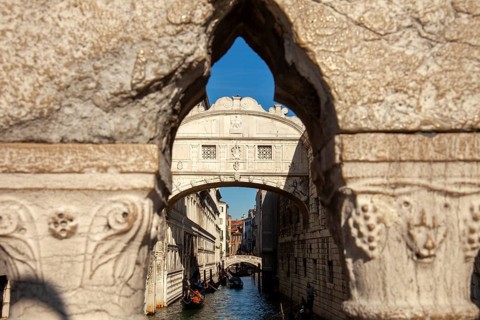 View of the Bridge of Sighs through the railing of the Ponte della Paglia, Venice, Veneto, Italy