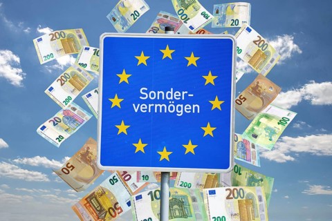 (Photo montage) Text SPECIAL ASSETS on the border sign of the Federal Republic of Germany with euro