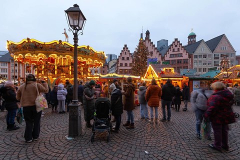 December 22, 2025, Frankfurt Christmas Market on Roemerberg with the skyline in the background at