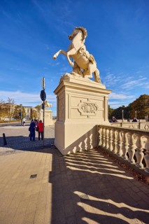 Castle bridge, entrance portal, horse sculpture, car bridge and footbridge, sidewalk, sandstone