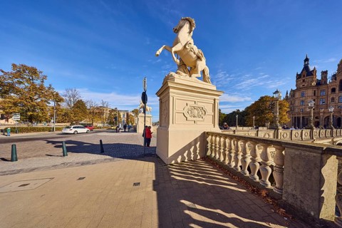 Castle bridge, entrance portal, horse sculpture, car bridge and footbridge, sidewalk, sandstone