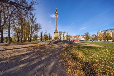 Victory column, general architecture, houses, trees with autumn leaves, meadow, fallen leaves, blue