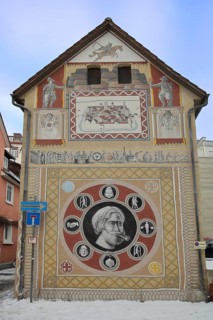 House with historical wall by artist group Kollektiv K 2020, historical paintings on the city's
