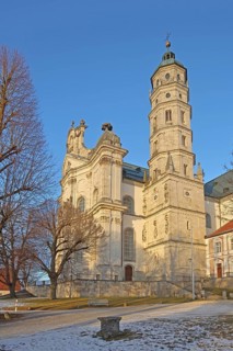 Late Baroque monastery church in winter with snow, courtyard, Benedictine monastery, Neresheim,
