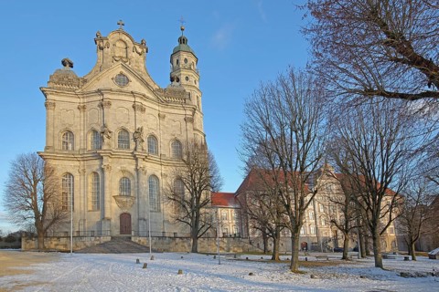 Late Baroque monastery church with snow in winter, Benedictine monastery, Neresheim, Härtsfeld,