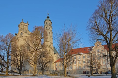 Late Baroque monastery church in winter with snow, courtyard, Benedictine monastery, Neresheim,
