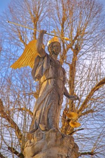 Justice as an angel and golden crown with cross and beam scale, golden wings, symbol of justice and