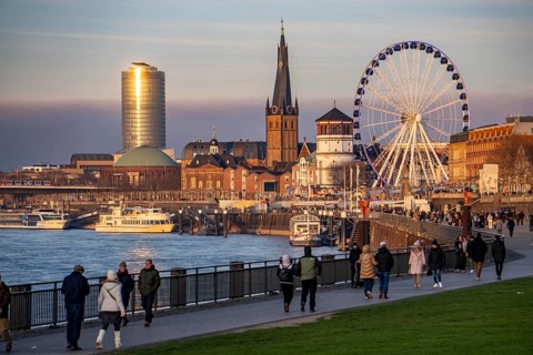 Rhine promenade in Düsseldorf, Ferris wheel, old castle tower, St. Lambert Basilica, old town, ERGO