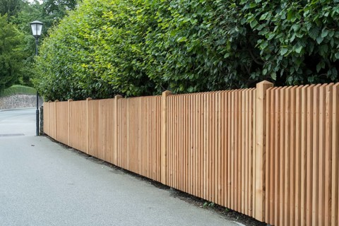 Wooden fence on the side of the road, vertical slats, town of Tegernsee, Upper Bavaria, Bavaria,