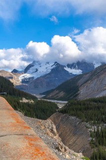 Breathtaking panorama from the skywalk reveals the majestic athabasca glacier surrounded by rugged