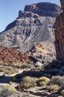 Steep mountain scenery with sparse vegetation in a dry landscape, Pico del Teide National Park, La