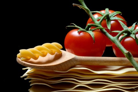 Lasagna, lasagna leaves and cooking spoon with fusilli noodle, noodle nest pasta type