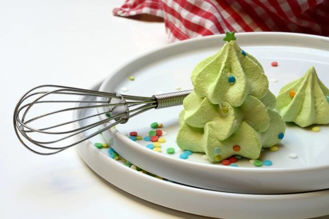 Meringue in the shape of a Christmas tree and whisk, Christmas cookies, meringue