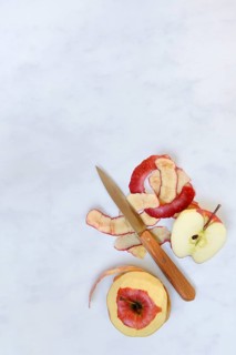 Peel apples with a knife, apple peels