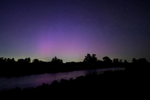 Aurora borealis aurora borealis on the Hunte dyke, Dümmerniederung nature park Park, Lower Saxony,