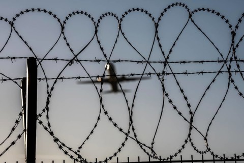 Symbolic picture security at the airport, outer fence at Düsseldorf International Airport, steel