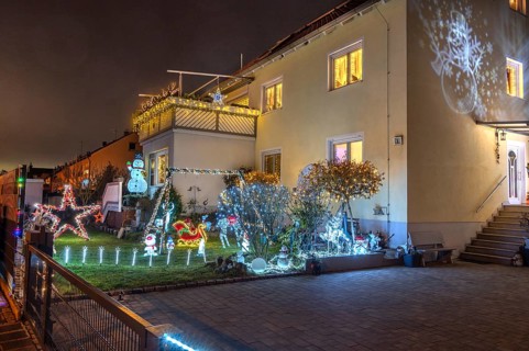 Illuminated Christmas decoration in the garden of a residential building, Nuremberg, Bavaria,