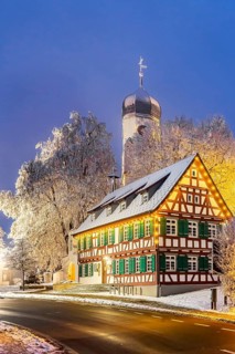 St. Stephen's Church Westerheim in winter with Christmas tree. hoarfrost. Westerheim, Alb-Danube