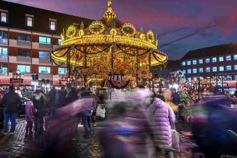 Nostalgic children's carousel at the children's Christmas market in the evening, Hans-Sachs-Platz,