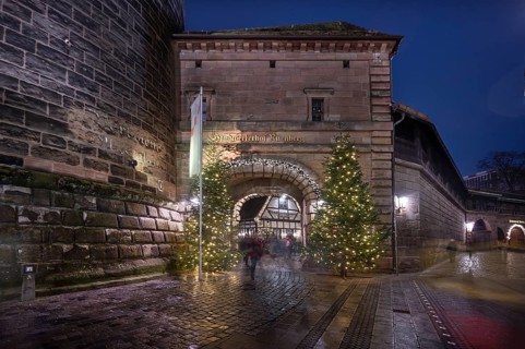 Decorated entrance to the Handwerkerhof during Advent, Königstor, Nuremberg, Middle Franconia,