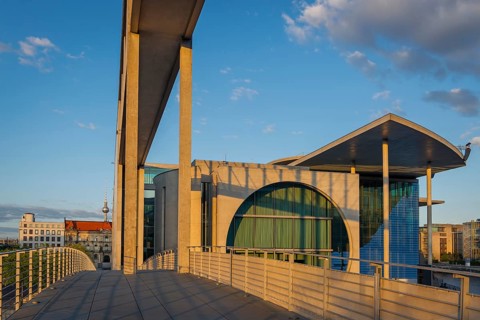 Footbridge with Marie-Elisabeth Lüders House in the evening light on the Spree in the government