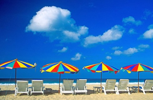 Umbrellas and sun loungers on Karon Beach, two years in front of the tsunami, Ko Phuket, Thailand,