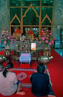 Believers pray at Wat Chalong monastery, Ko Phuket, Thailand, December 2002, vintage, retro, old,