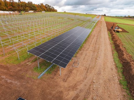 Solar plant construction frames cover large fields, energy transition, construction of PV open