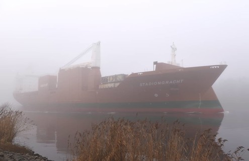 Freighter STADIONGRACHT in fog in the Kiel Canal, NOK, Kielkanal, Kielcanal, Schleswig-Holstein,