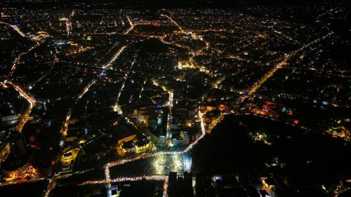 A Drone night view of Aleppo, Syria on December 19, 2025, showing illuminated streets, dense