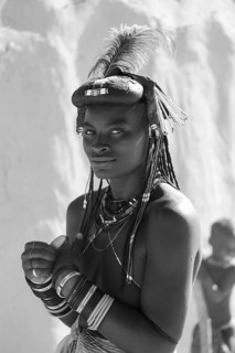 Black and white, portrait, brightly decorated woman of the Hakaona tribe, also Havakona or