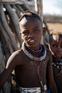 Portrait, Himba boy, traditional Himba village, Kaokoveld, Kunene, Namibia
