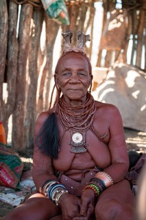 Elderly Himba woman, portrait, traditional Himba village, Kaokoveld, Kunene, Namibia