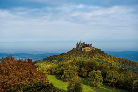 Castle and autumnal forest, Hohenzollern Castle, sunrise, Hechingen, Swabian Jura,