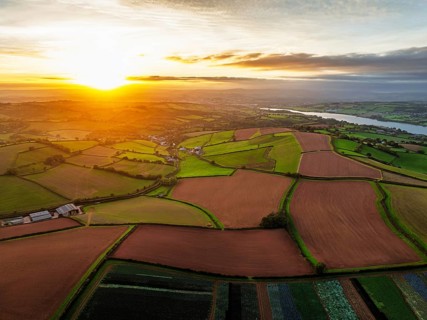 Colours of autumn Fields and Farms over Sheldon from a drone, Torbay, Devon, England, United
