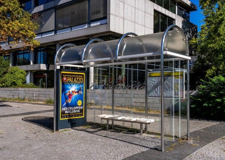 Bus stop with bus shelters and timetable at Ernst Reuter Platz in Berlin-Charlottenburg, Germany