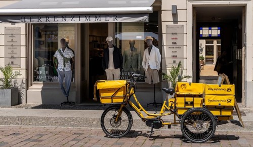 Deutsche Post bicycle loaded with luggage, letter and parcel delivery, Potsdam, Brandenburg,
