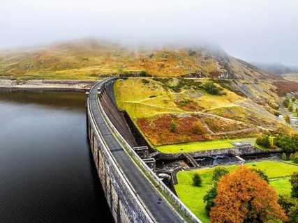 Autumn over Claerwen Dam, Claerwen Valley, Elan Valley Reservoir, Rhayader, Powys, Wales, UK