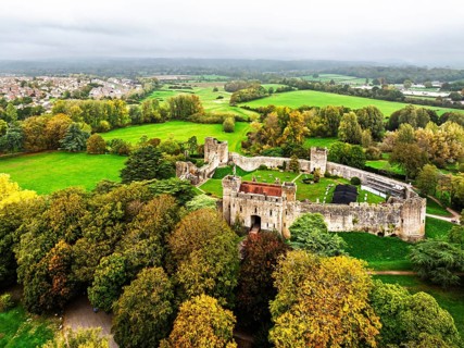 Autumn Colours over ruins of Caldicot Castle from a drone, Caldicot, Monmouthshire, Wales, UK