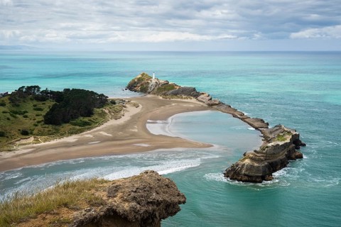 Deliverance Cove and Castlepoint Lighthouse, Castle Rock views, rocks, ocean. Castlepoint,