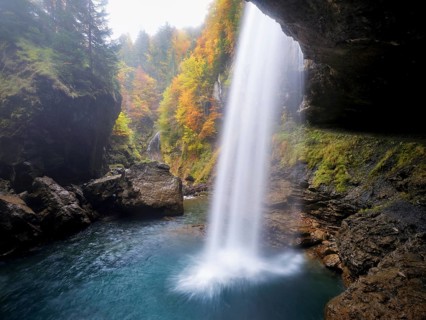 Waterfall mountain list in autumn-colored surroundings, Linthal, Klausenpass, Canton of Glarus,