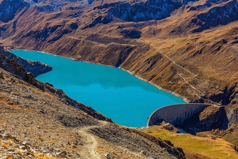 The dam and turquoise lake Lac de Moiry, Val d'Anniviers, Valais Alps, Canton of Valais,