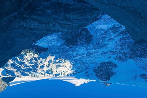 The Moiry glacier and mountain peaks are reflected in Lac de Chateaupre, Val d'Anniviers, Valais