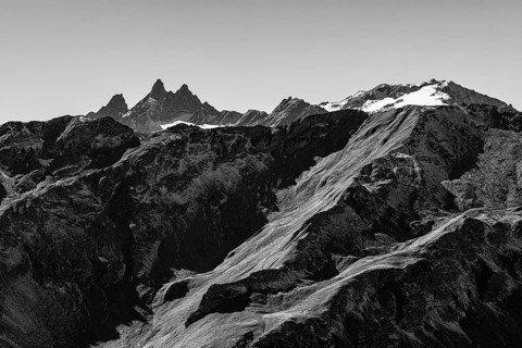 Snowy peaks of the Pointe de Moiry mountains, black and white photo, Val d'Anniviers, Valais Alps,