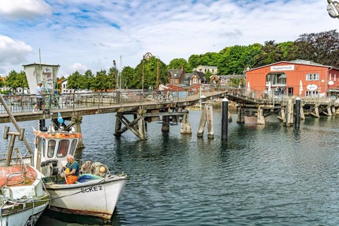 Eckernförde wooden bridge and the Siegfried shipyard at the inland port in Eckernförde,
