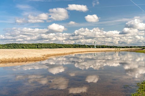 Falkensteiner Beach and Friedrichsort lighthouse on the Kiel Fjord, Kiel, Schleswig-Holstein,