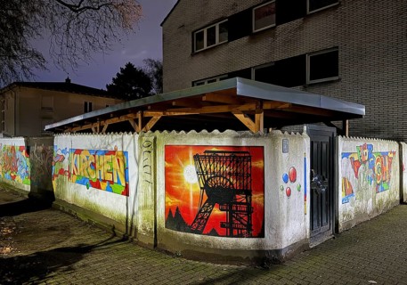 Wall painting in the street Flöz Sunshine at night in one of the poorest cities in Germany,