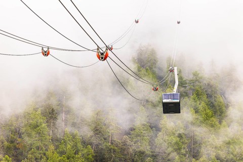 Gondola and cable car line in fog, cable car from Grimentz to the Espace Weisshorn summit station,